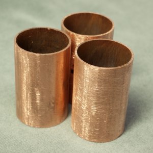 Sanded copper Tube sections.